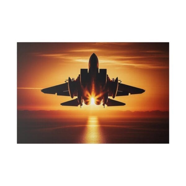 Silhouette of fighter jet flying into sunset.