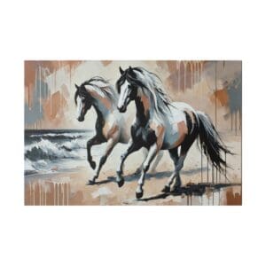 Two white horses running on the beach.