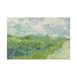 Green field with clouds in the sky.