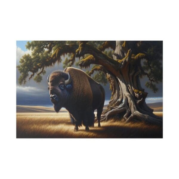 A bison stands by a large tree.