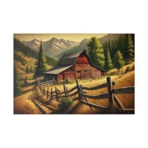 Red barn in a mountain valley with a fence.