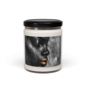 Jar candle with abstract face artwork label.