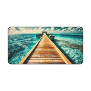 Wooden pier extending into turquoise ocean.