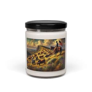 Candle jar with cowboy and cattle design.