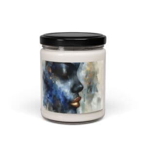 Candle jar with abstract face artwork.