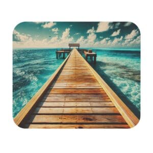 Wooden pier extending into turquoise ocean.