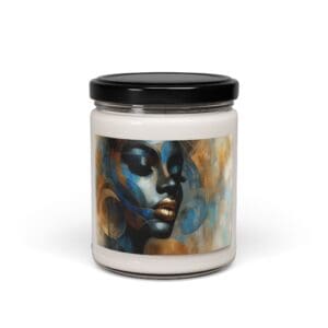 Candle jar with abstract face artwork.